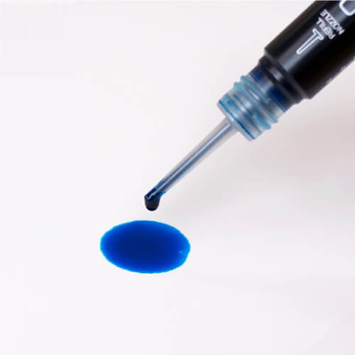 Start by dropping the ink directly on a smooth and silky medium. The ink will spread out on the surface once in contact, creating a circle-like shape of the color.